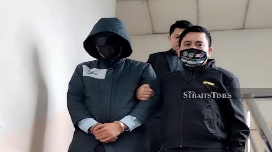 Pontian school administrator hit with 40 charges over RM100k in false claims