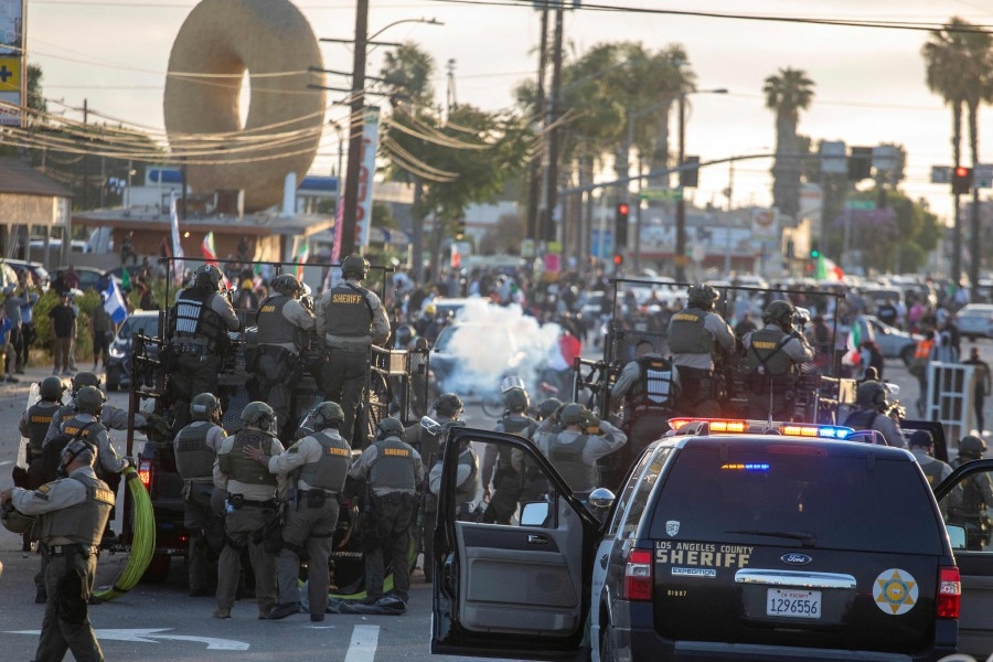 National Guard deploys in LA as Trump warns of 'troops everywhere'