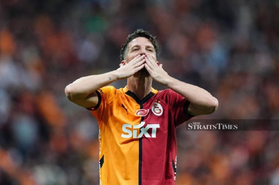 Belgium's Mertens announces retirement from football