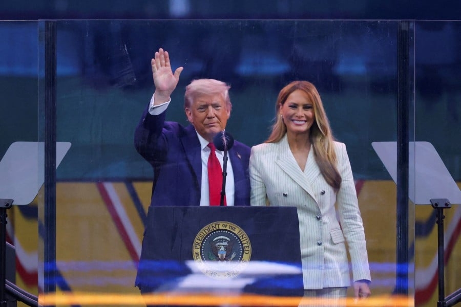 Trump showcases US military might as protesters decry 'dictator' moves