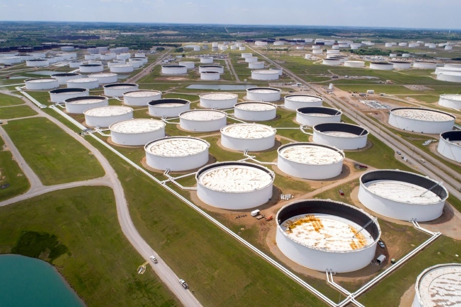 Oil prices hold gains ahead of US-China trade talks