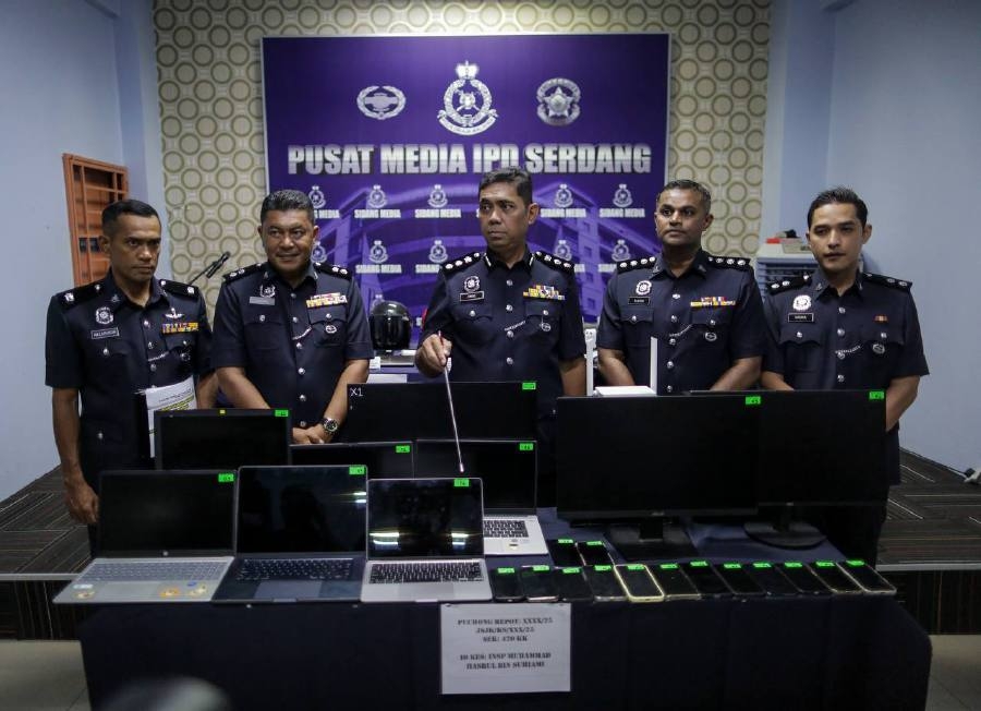 Police bust Puchong investment scam syndicate, 10 arrested