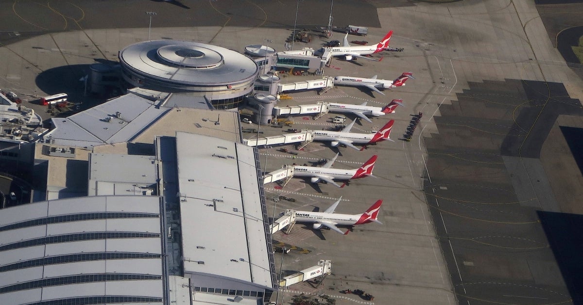 Qantas plane damaged in collision with aerobridge at Sydney Airport