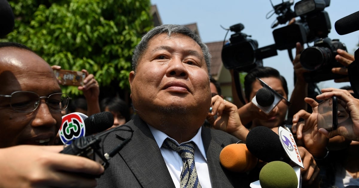 Thai construction tycoon and 14 others surrender to police over fatal Bangkok tower collapse