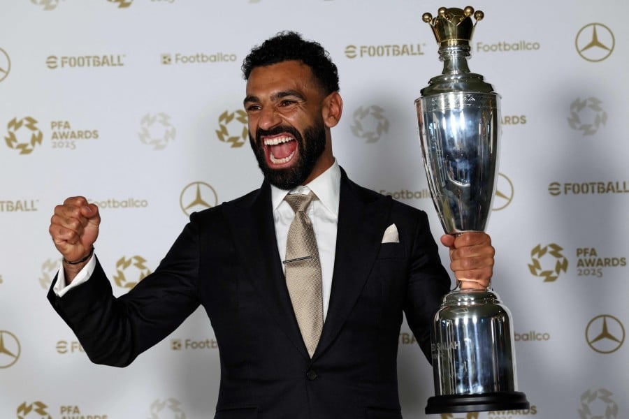 Liverpool's Salah crowned PFA Player of the Year for a record third time