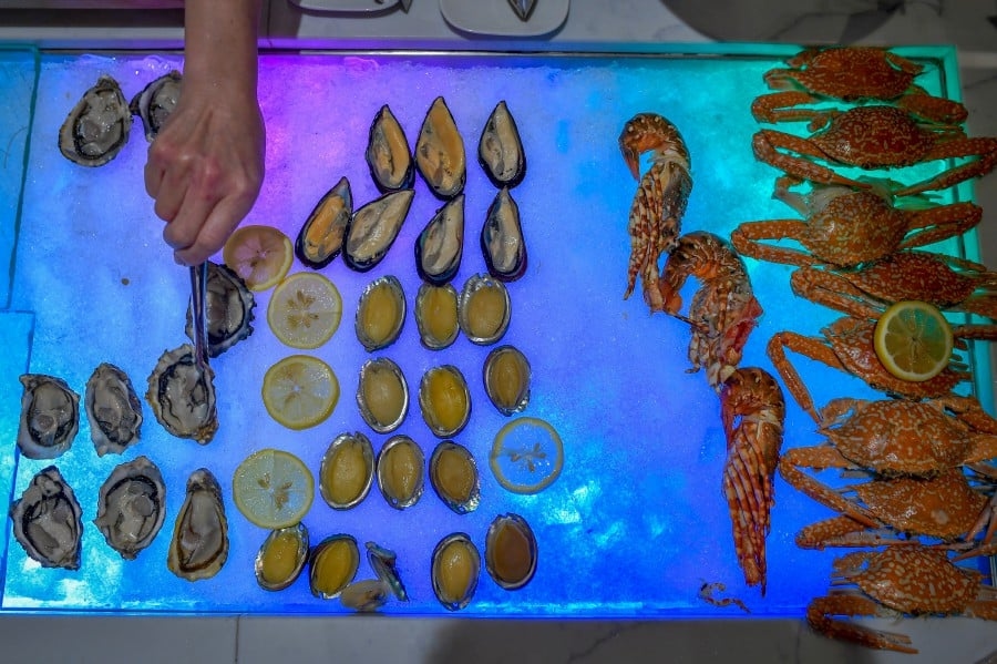 China eases Japanese seafood ban, maintains curbs on Fukushima