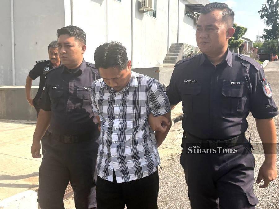 Teacher charged with possession of child porn claims trial