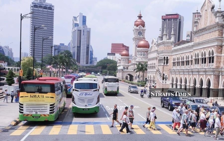 Bus drivers struggle on RM700 basic pay, rely on overtime