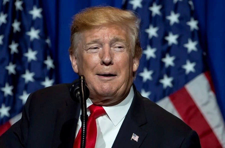 Trump raises pressure on Fed with call for governor to resign