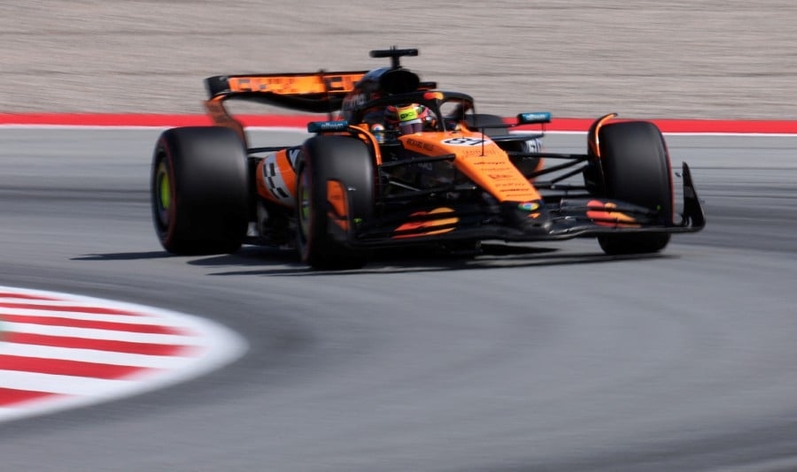 Piastri outpaces Norris in 'mega' McLaren to grab Spanish GP pole