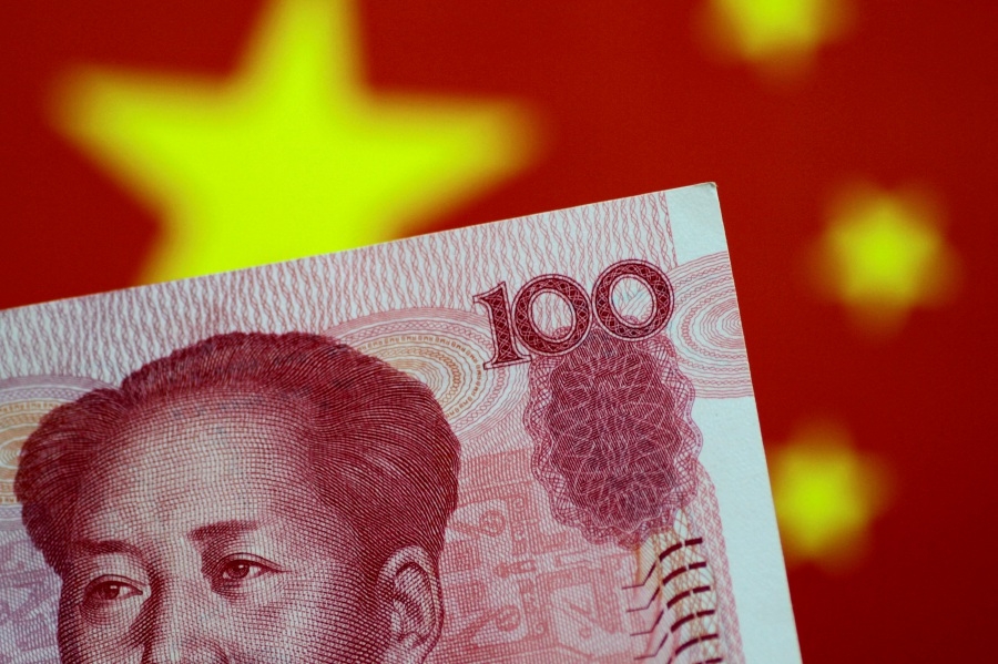 China's yuan dips after Beijing announces sweeping monetary easing measures