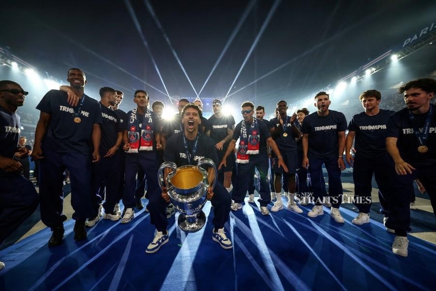 Jubilant PSG parade Champions League trophy in Paris