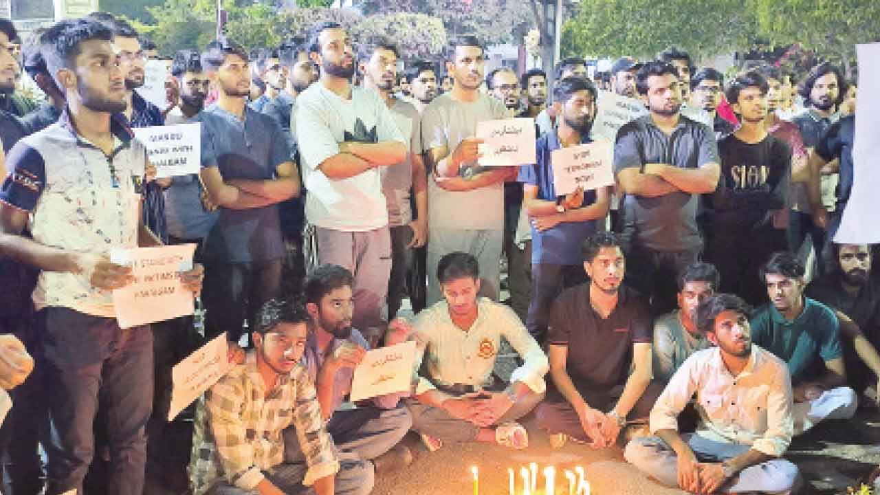 MANUU students hold candlelight march