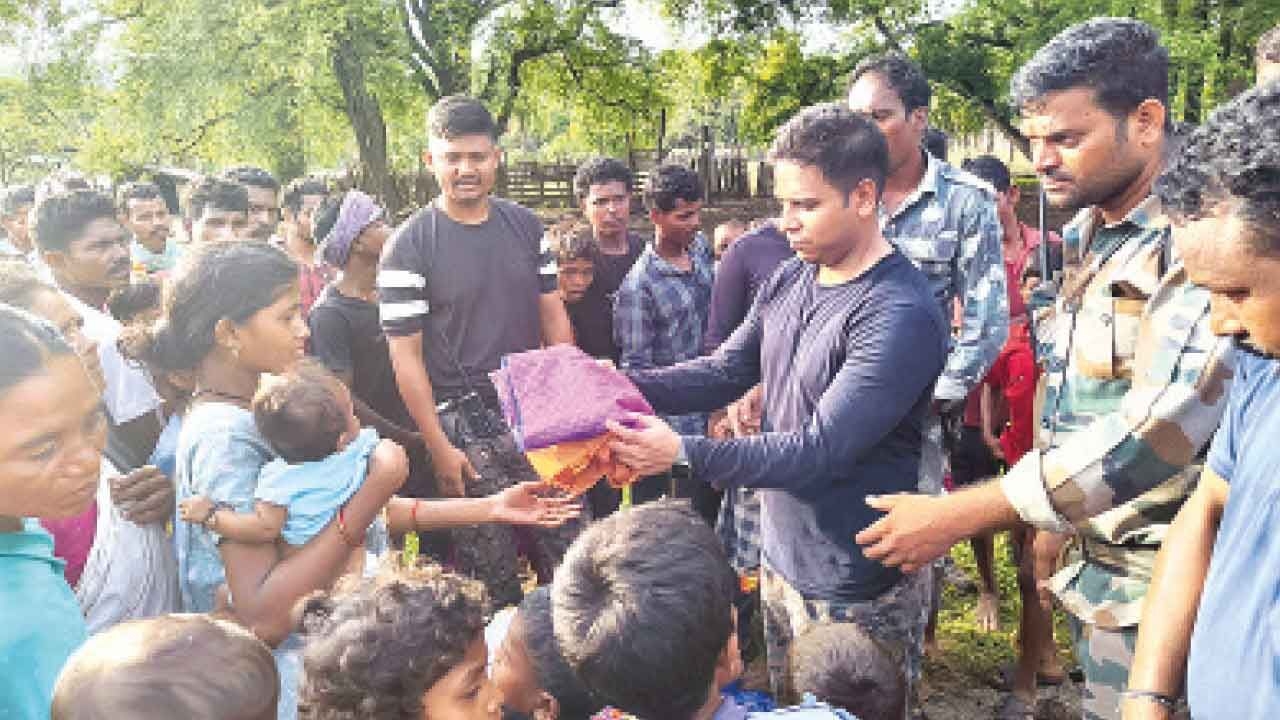 Police distribute volleyball, clothes in Maoist-hit village