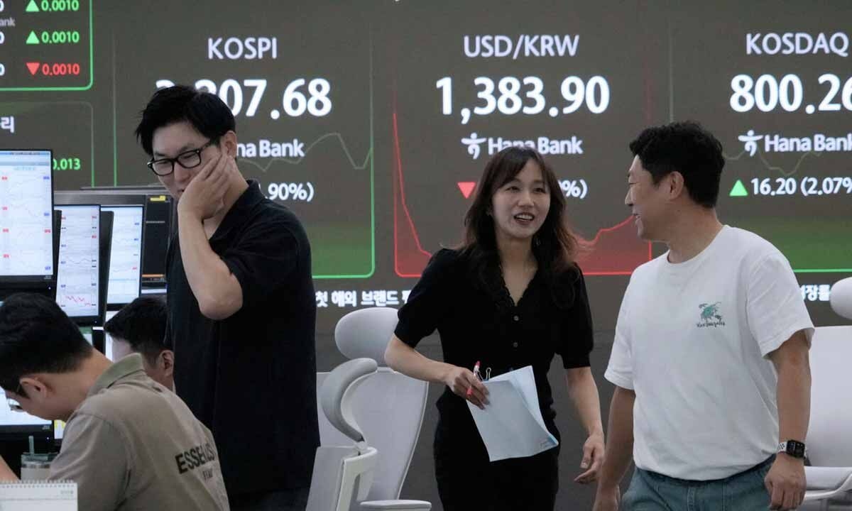 Asian shares track rally on Wall Street that won back most of Friday's wipeout