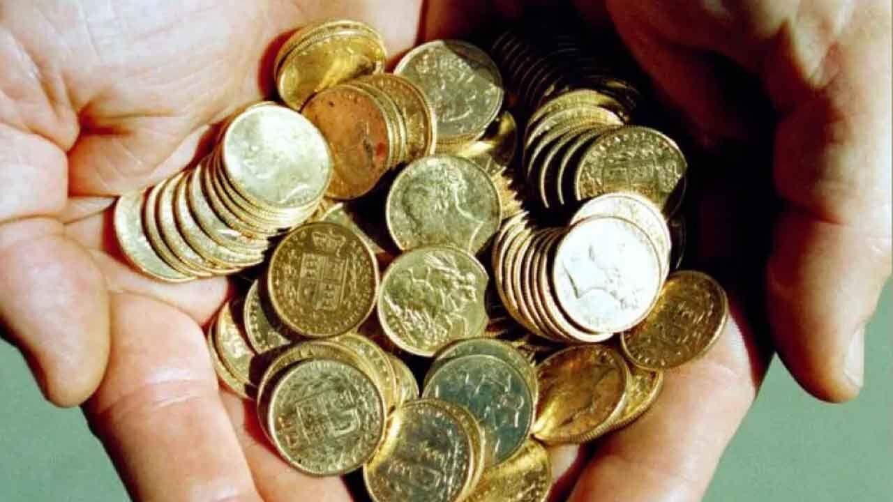 Gold futures fall on muted demand