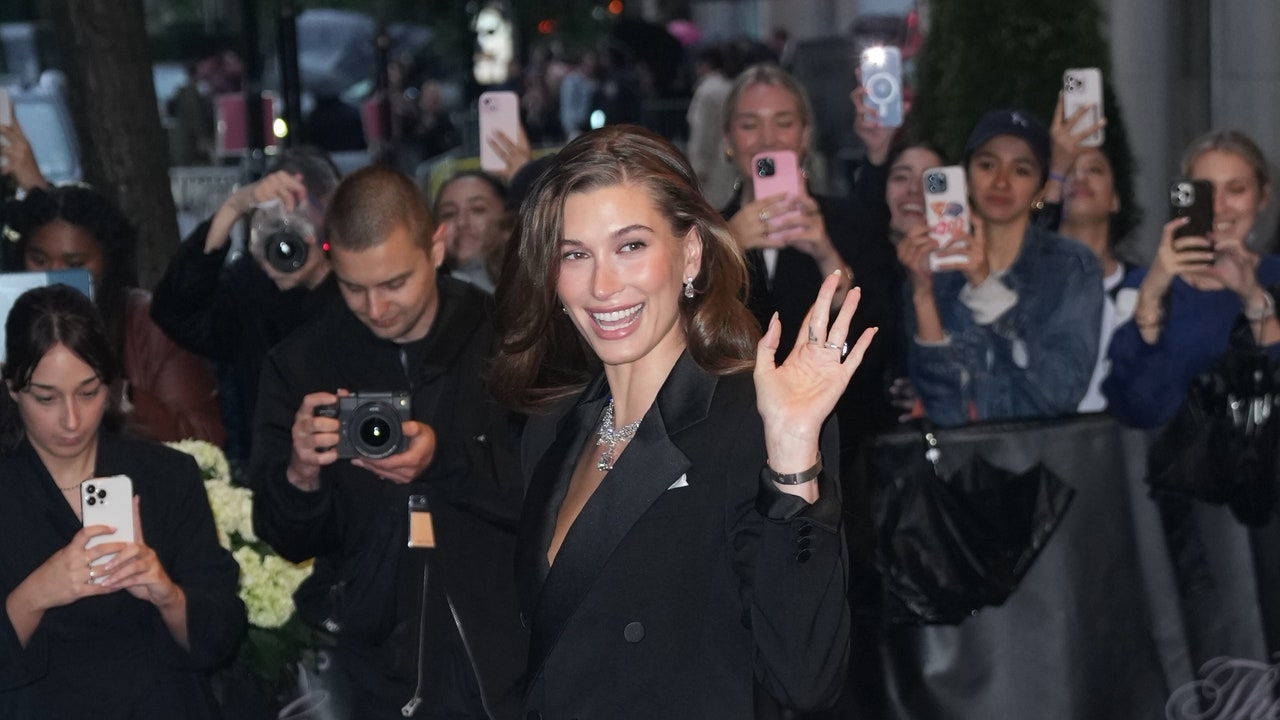 Hailey Bieber Accessorizes Her Pantless Look With a Dirty Martini at the 2025 Met Gala