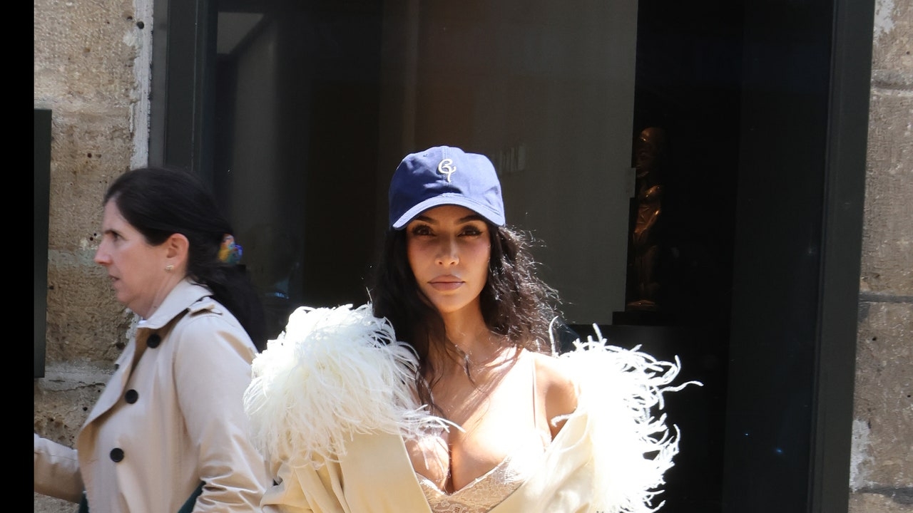 Kim Kardashian Pushes High-Low Dressing to the Extreme