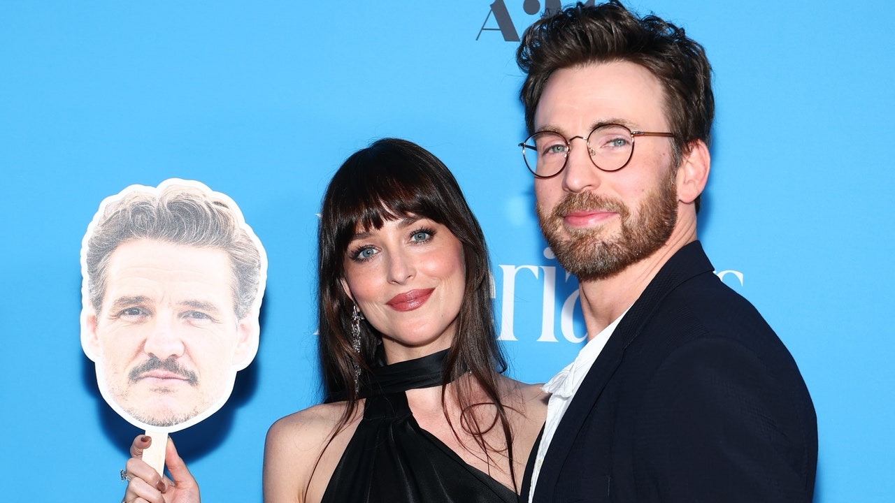 Dakota Johnson Accessorizes With Pedro Pascal's Head