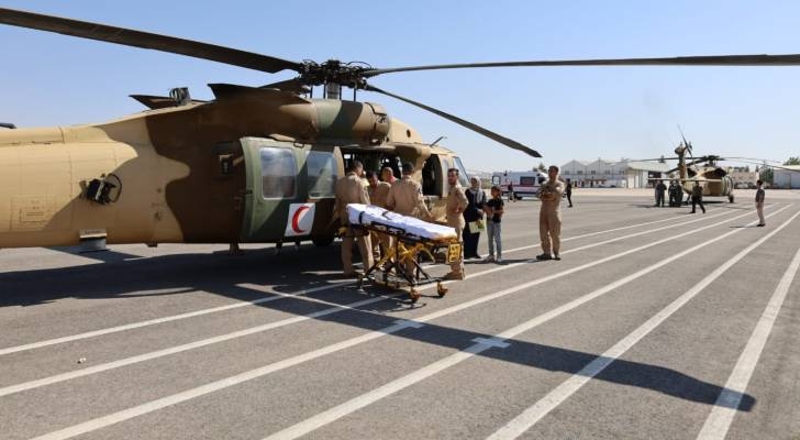 PHOTOS - Jordan airlifts injured children out of Gaza for treatment
