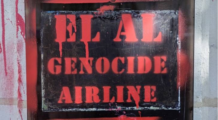 'Israeli' airline's Paris office defaced with red paint in protest of Gaza genocide