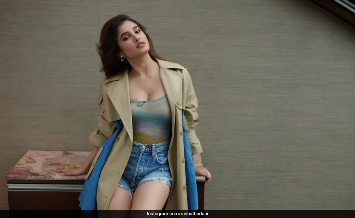Rasha Thadani Makes Her Denim Shorts And Bodysuit Look Trench-Coat Chic
