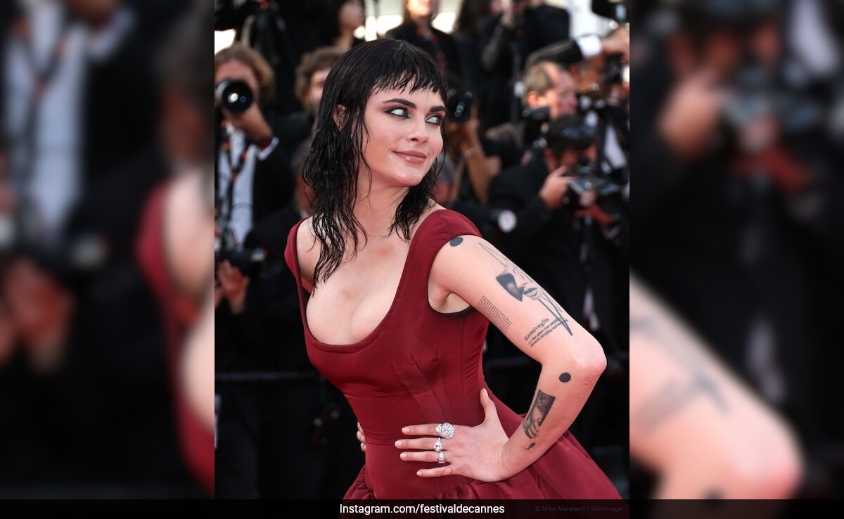 Cara Delevingne Is A Gothic Queen At Cannes 2025 In A Burgundy Gown And Grunge Hair