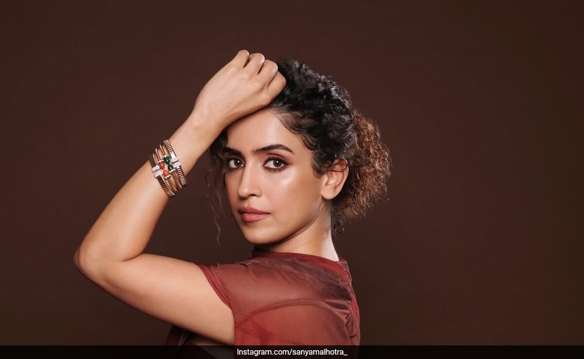 Sanya Malhotra Powers Through The Week In A Rust Lycra Skirt Set With Drape