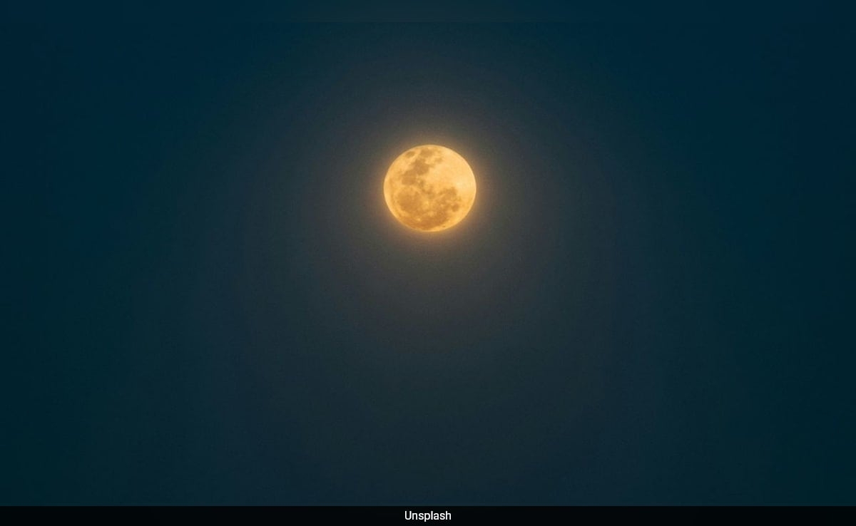 Shiny Orange Glass Beads On Reveals Moon's Explosive Past