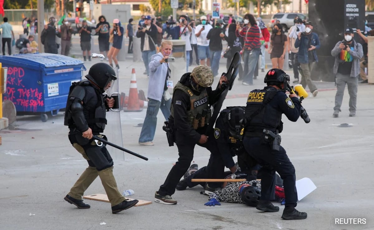 Riot Police, Anti-ICE Protesters Square Off In Los Angeles After Raids