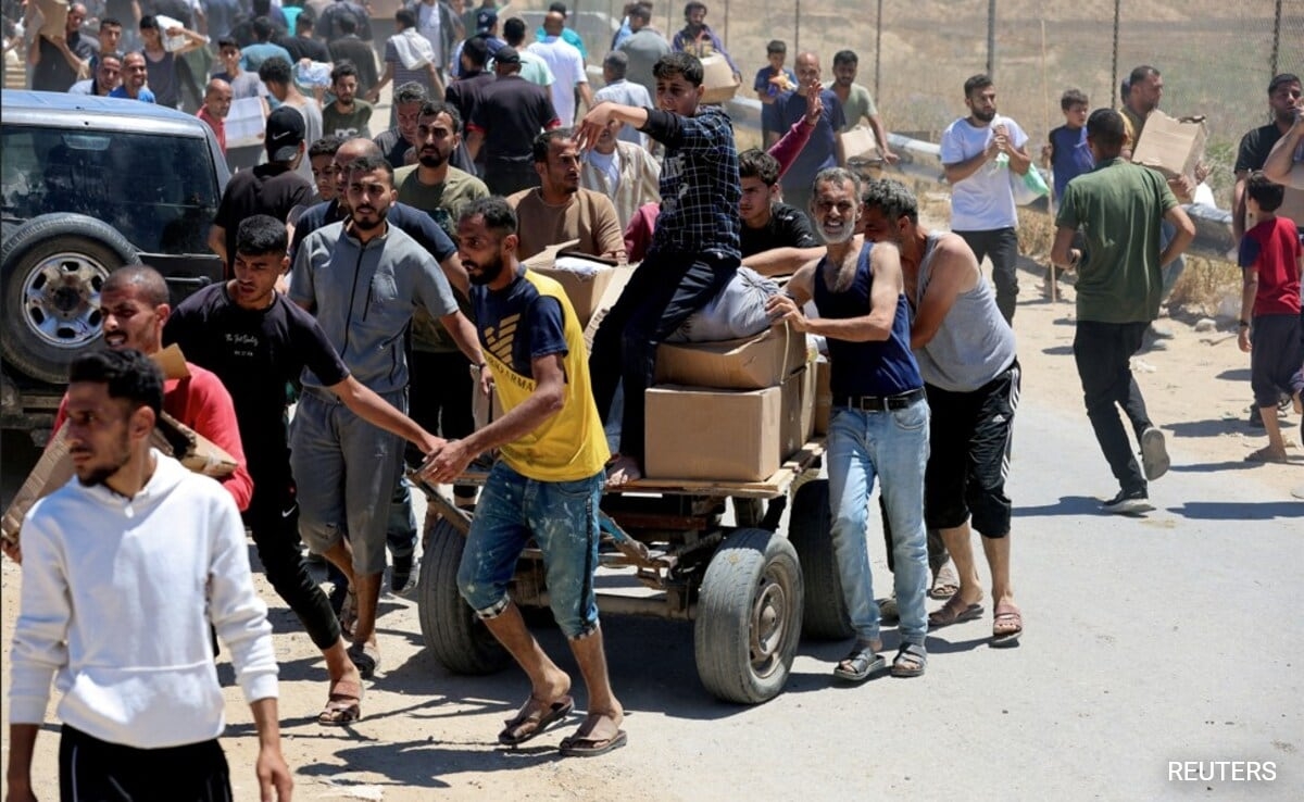 Israel Accuses Hamas Of Firing At Aid Centre In Gaza That Killed Over 30