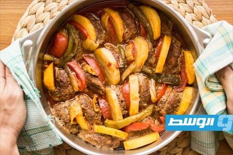طاجن بطاطا بالصلصة والكفتة