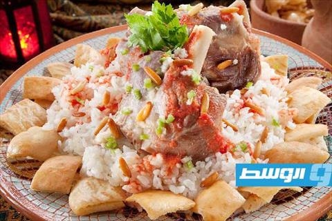 ريش في الفرن مع الفتة