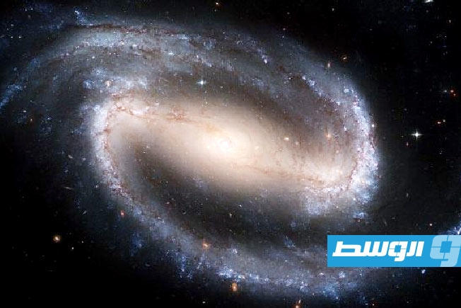 مجرة حلزونية عملاقة في بدايات الكون تُربك العلماء (فيديو)
