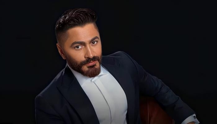 «في دمي ومقدرش أقسى عليها».. وشم لبسمة بوسيل على جسد تامر حسني