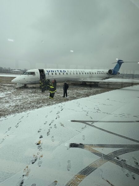 A GoJet-operated United Regional Jet slid off the taxiway after landing at St. Louis Lambert International Airport