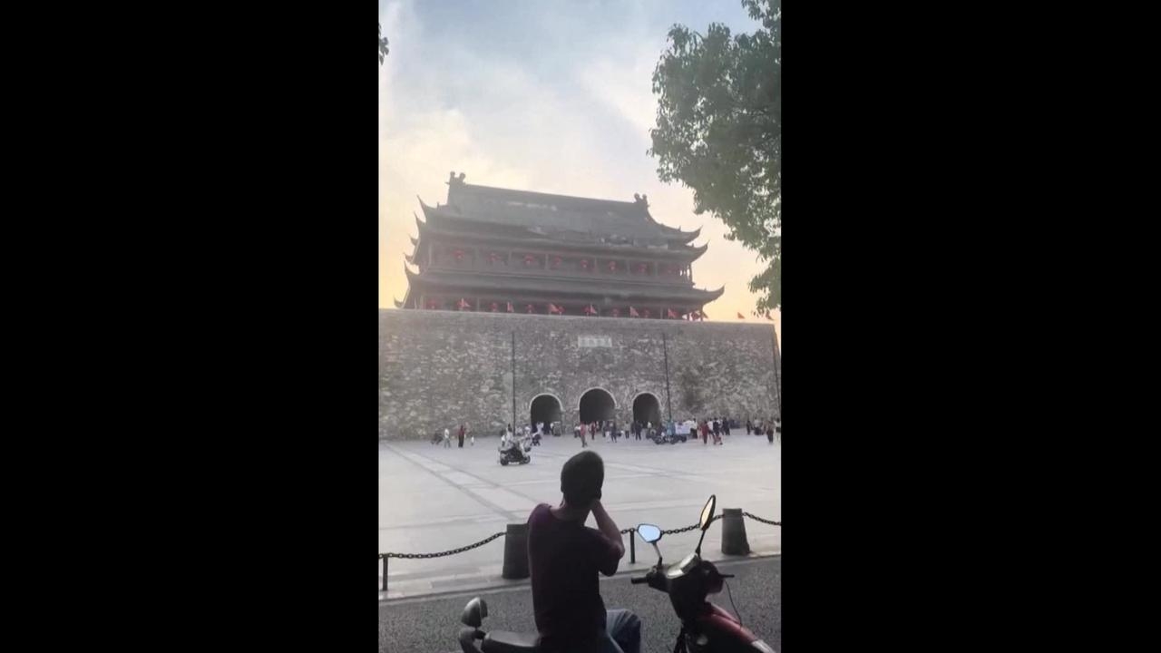 Shocking footage as roof of historic Ming Dynasty tower collapses in China