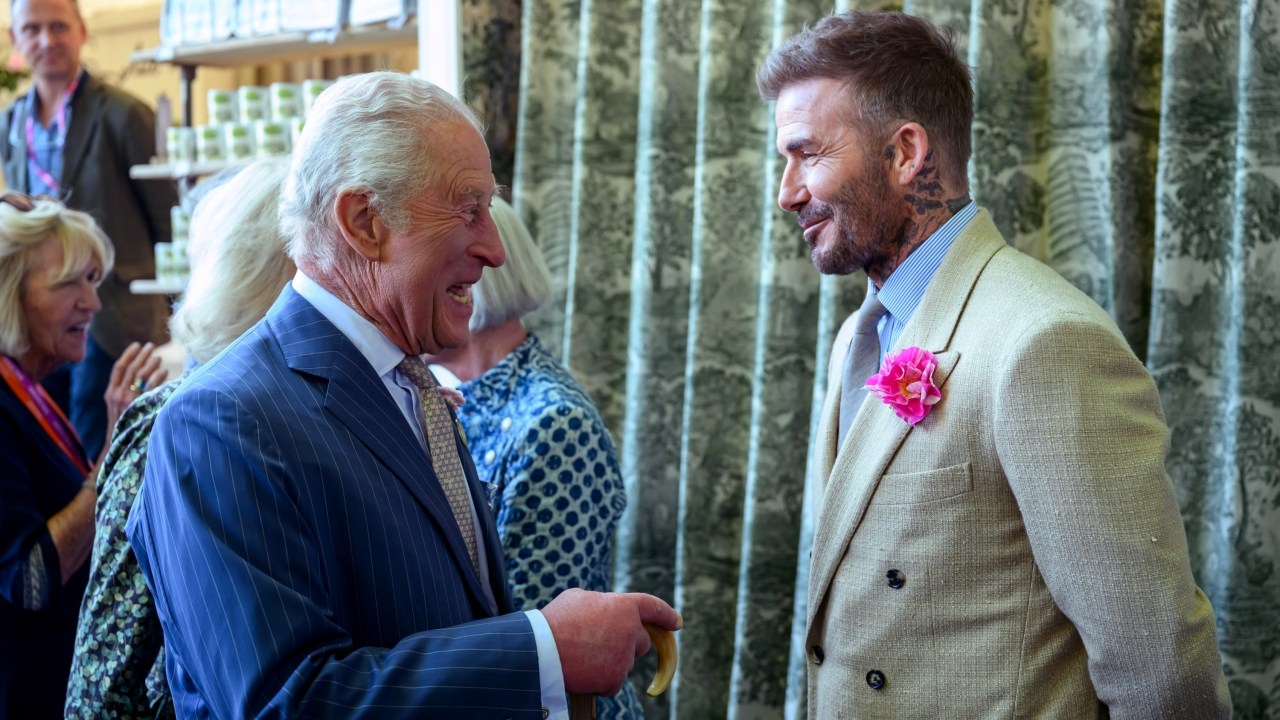 'Sir David and Lady Posh': Beckham to finally be awarded knighthood by King Charles after monarchy denied him honour for more than a decade