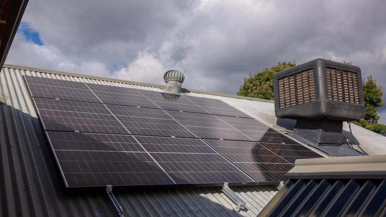 Labor accused of 'sending the country broke' by chasing renewables targets, as report warns major delays mean Australia will fall well short