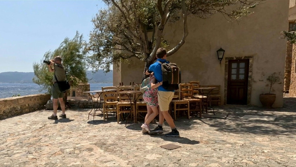 Two tourists die, fires erupt in Greece amid gale-force winds