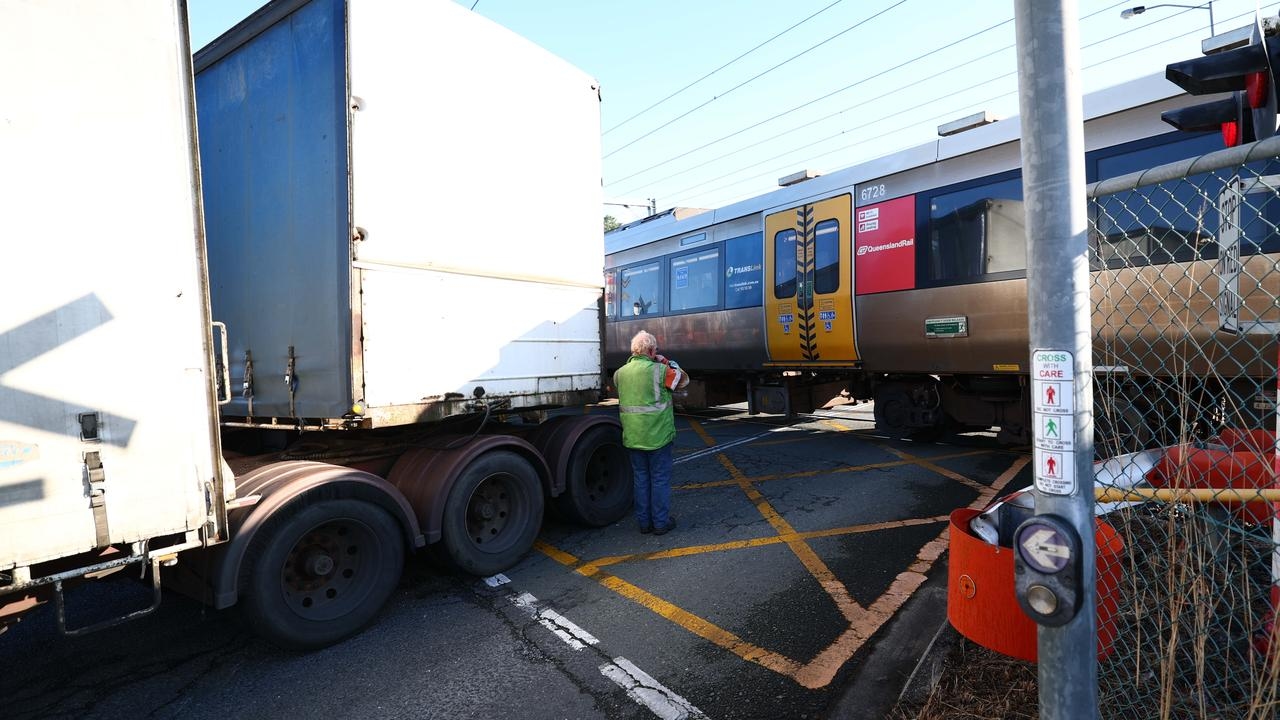 Truck and train collide in Brisbane outer-suburbs, chaos on Gold Coast line