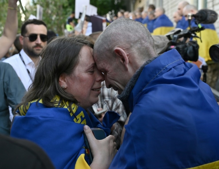 'Seventh heaven': Tears and laughter as Ukrainian POWs return