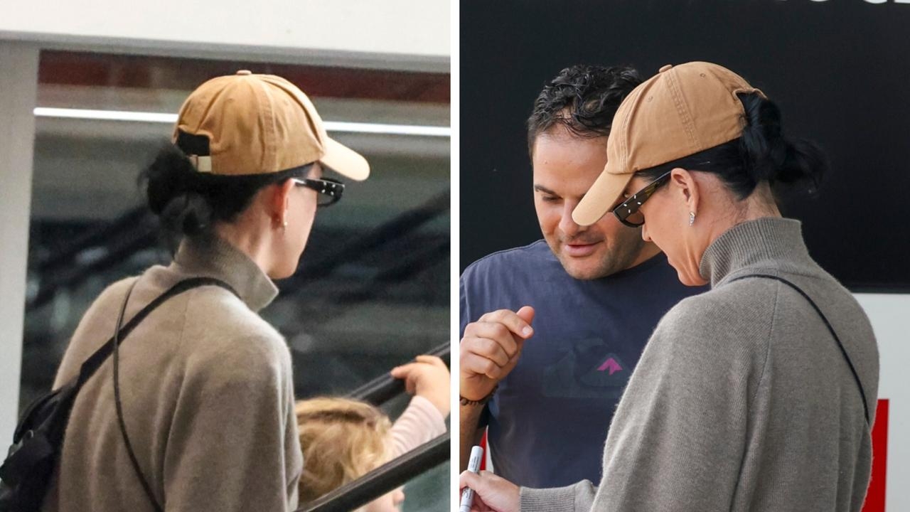 Katy Perry goes undercover at Sydney shopping centre hours after landing in Australia