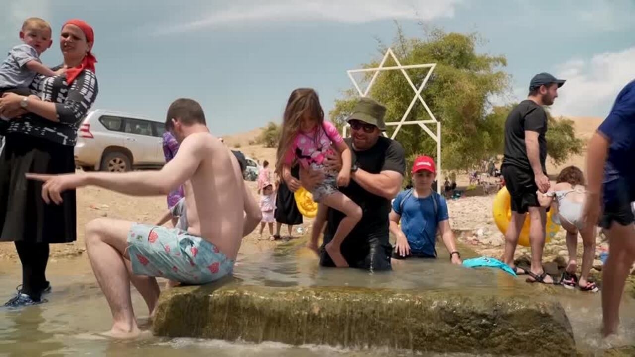 ‘This is our land' – Jewish settlers bathe in West Bank spring