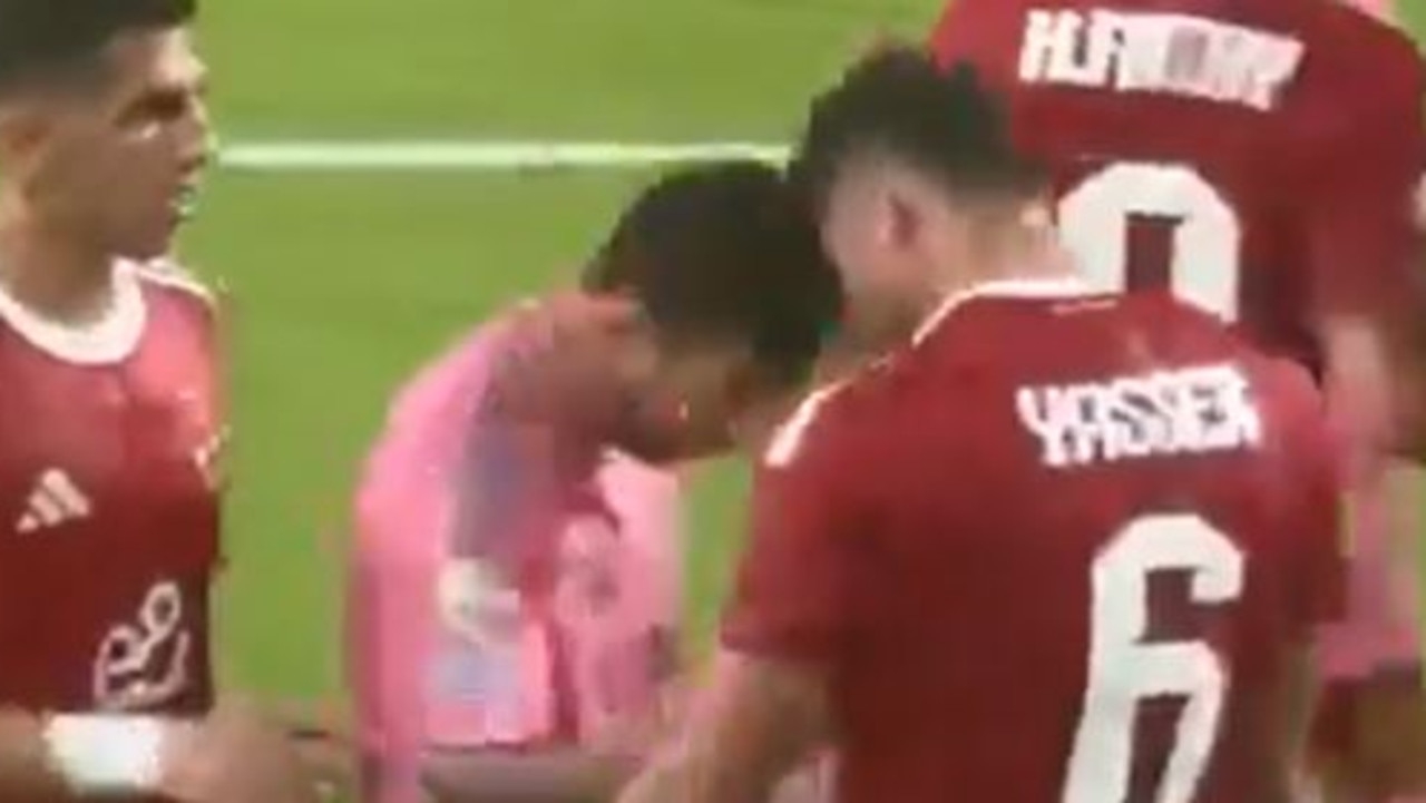 Tempers flare as Lionel Messi loses his cool and head butts opponent at FIFA Club World Cup