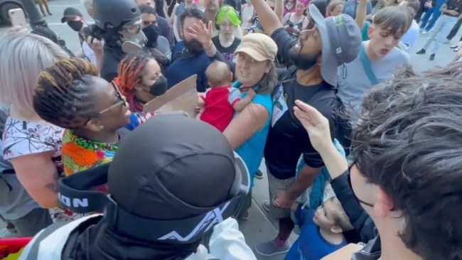 Trans rights radicals surround mother holding baby at Christian group rally outside Seattle City Hall