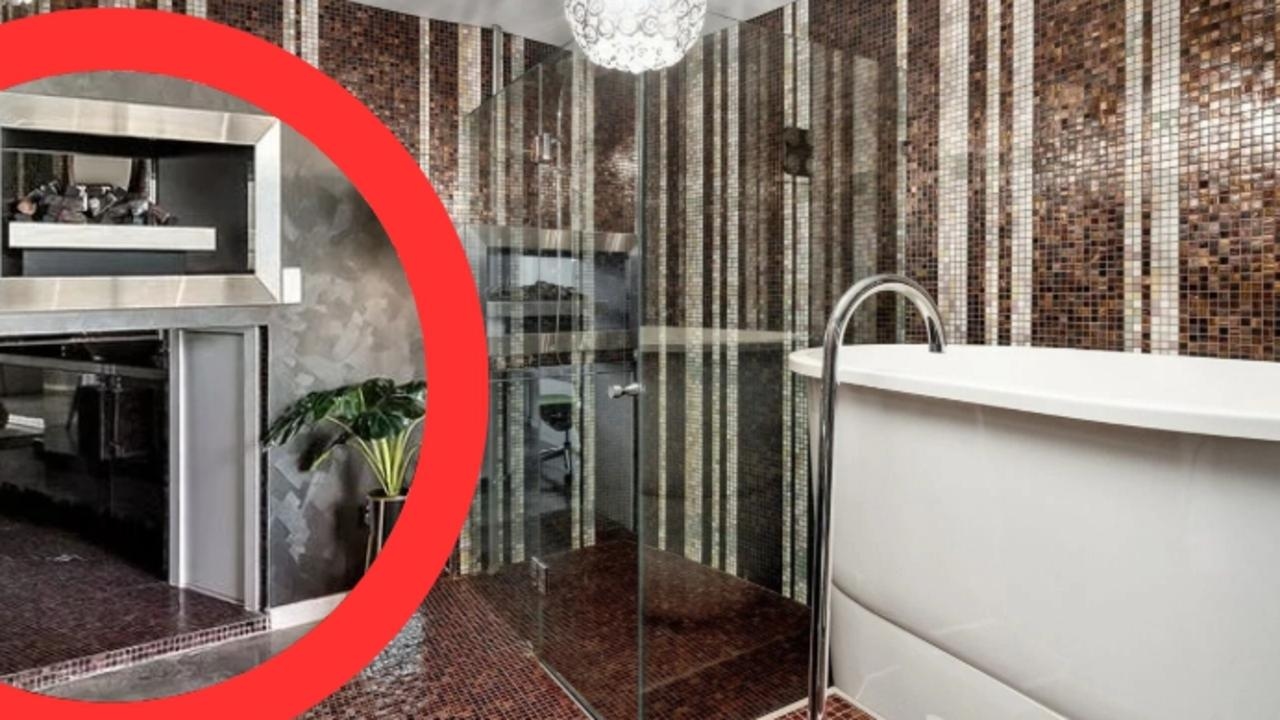 Carlton penthouse features bizarre crawl-through fireplace bathroom