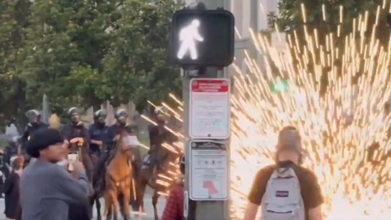Violent US organised rioters target police horsemen