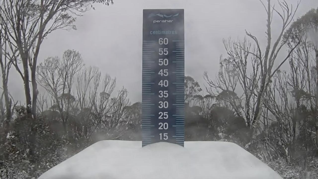 Perisher's peaks dusted with more than 10cm of snow ahead of ski season