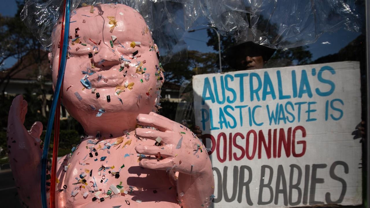 Indonesian protesters call for Australia to stop sending plastic waste as microplastic found in foetuses